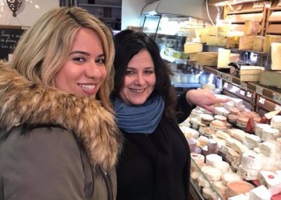 My uber-talented food guide (Alisa) explains to my client Naelene that France has over 350 cheese.  Oh my!